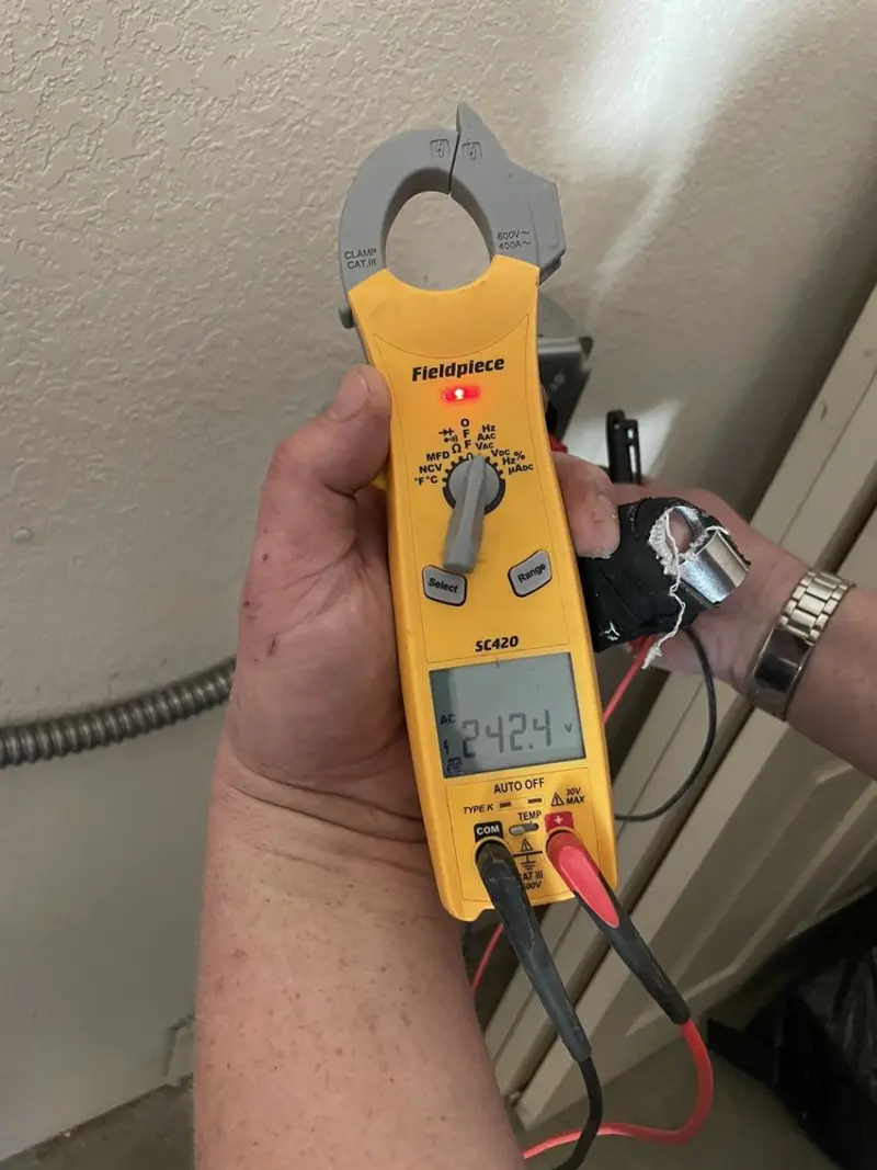 Voltage testing with clamp meter during Aluminum Wiring Replacement in New Holland